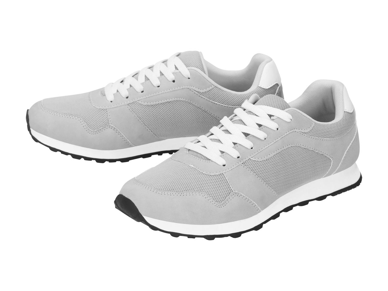 Pair of light grey sneakers with white laces and soles