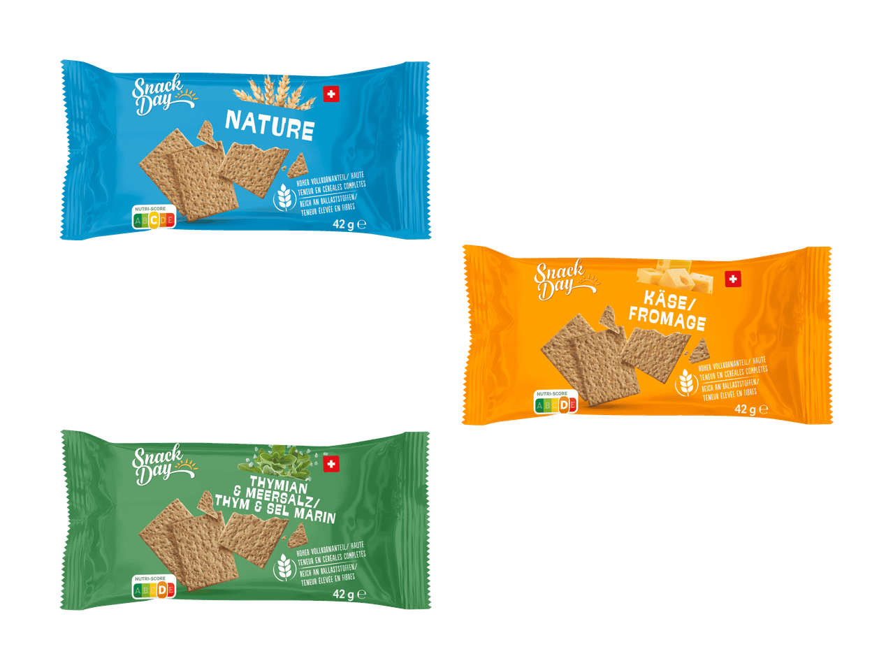 Drei Packungen Snack Day Cracker in den Geschmacksrichtungen Natur, Käse und Thymian mit Meersalz.