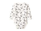 A white long-sleeved baby bodysuit with a black Peanuts character and logo print.