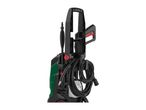 A black and green Kärcher pressure washer with accessories neatly stored.