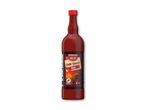 En flaske med rød chilisauce med teksten 'Chilli Sauce Hot' på etiketten.
