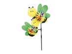 Two bee-shaped garden wind spinners with colorful pinwheels on a black pole.