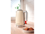 Cream Silvercrest 3100 W kettle on a wooden kitchen countertop.