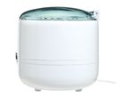 White ultrasonic jewelry cleaner with a transparent blue lid