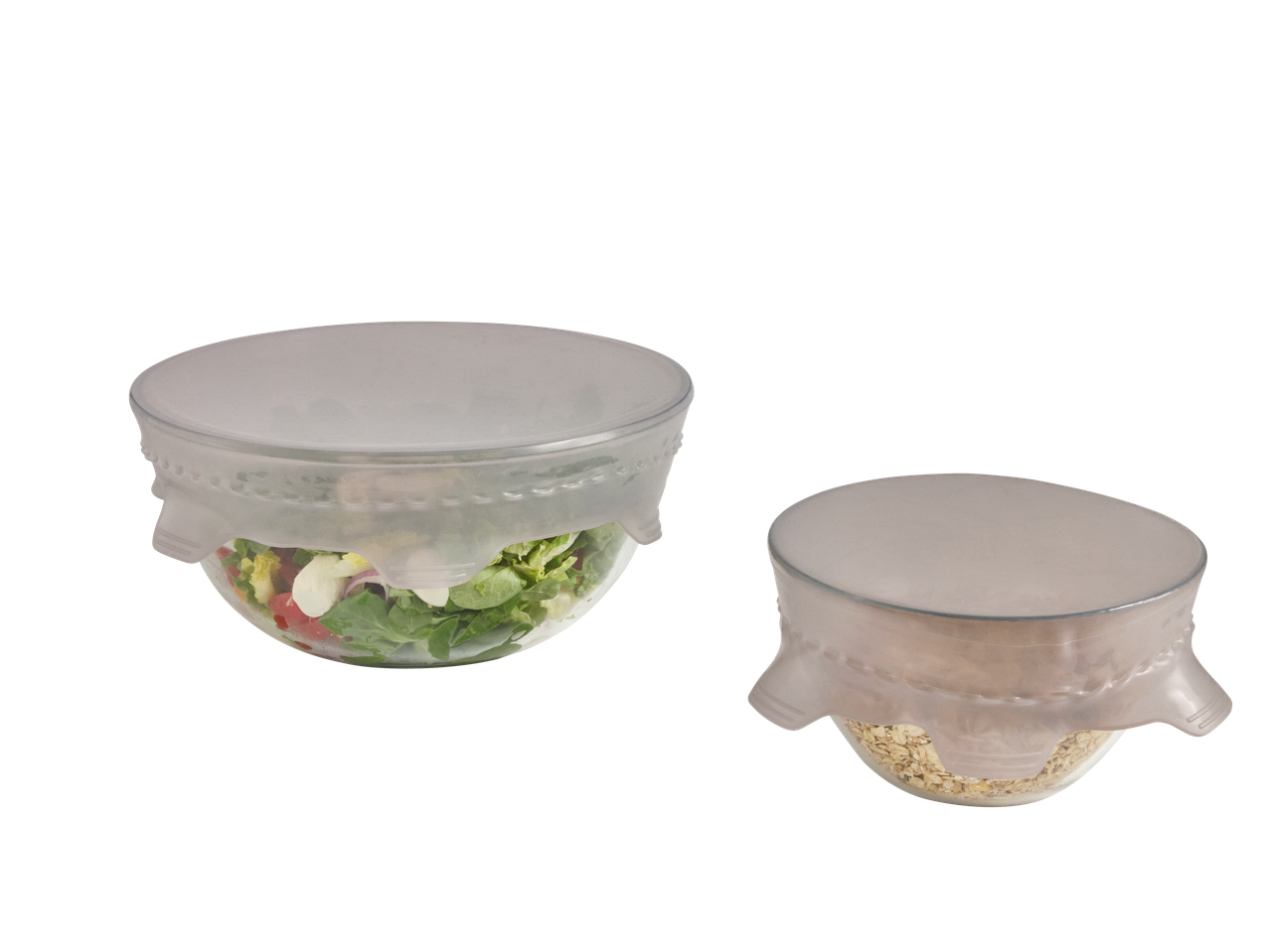 Tampas de silicone Silvercrest® em tigelas com salada e aveia