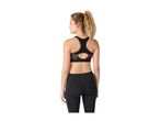 Woman from behind wearing a black and colorful sports bra and black leggings.