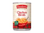 Can of chicken broth with a bowl of soup and a red tartan cloth.