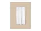 White shower curtain with a textured pattern hanging on a silver rod against a beige wall.