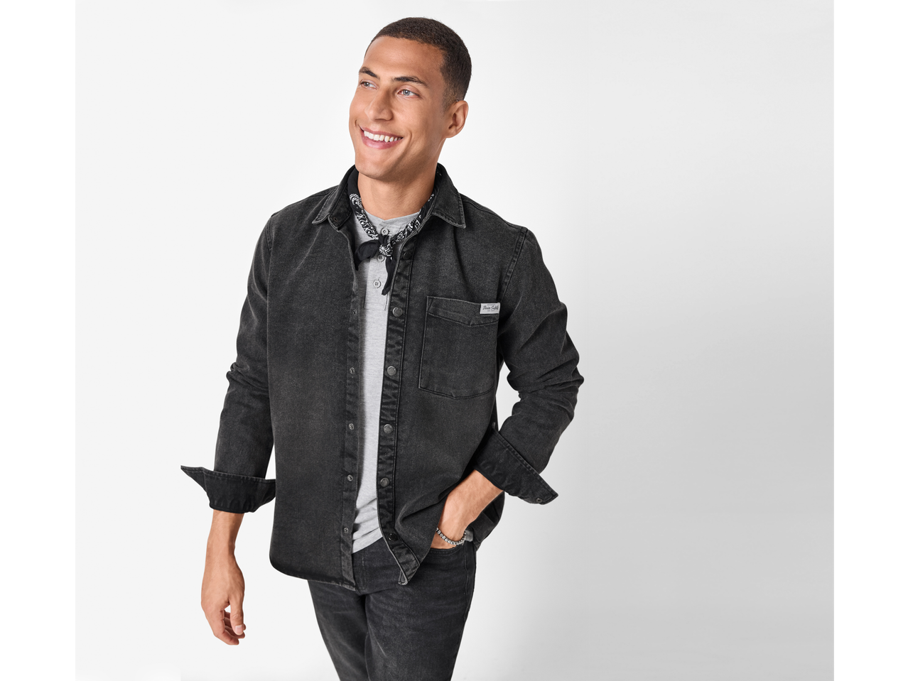 Man wearing an esmara® men's denim shirt, light grey t-shirt, and black bandana.