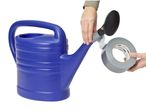 A person attaching a shower head to a blue watering can with 3M duct tape.