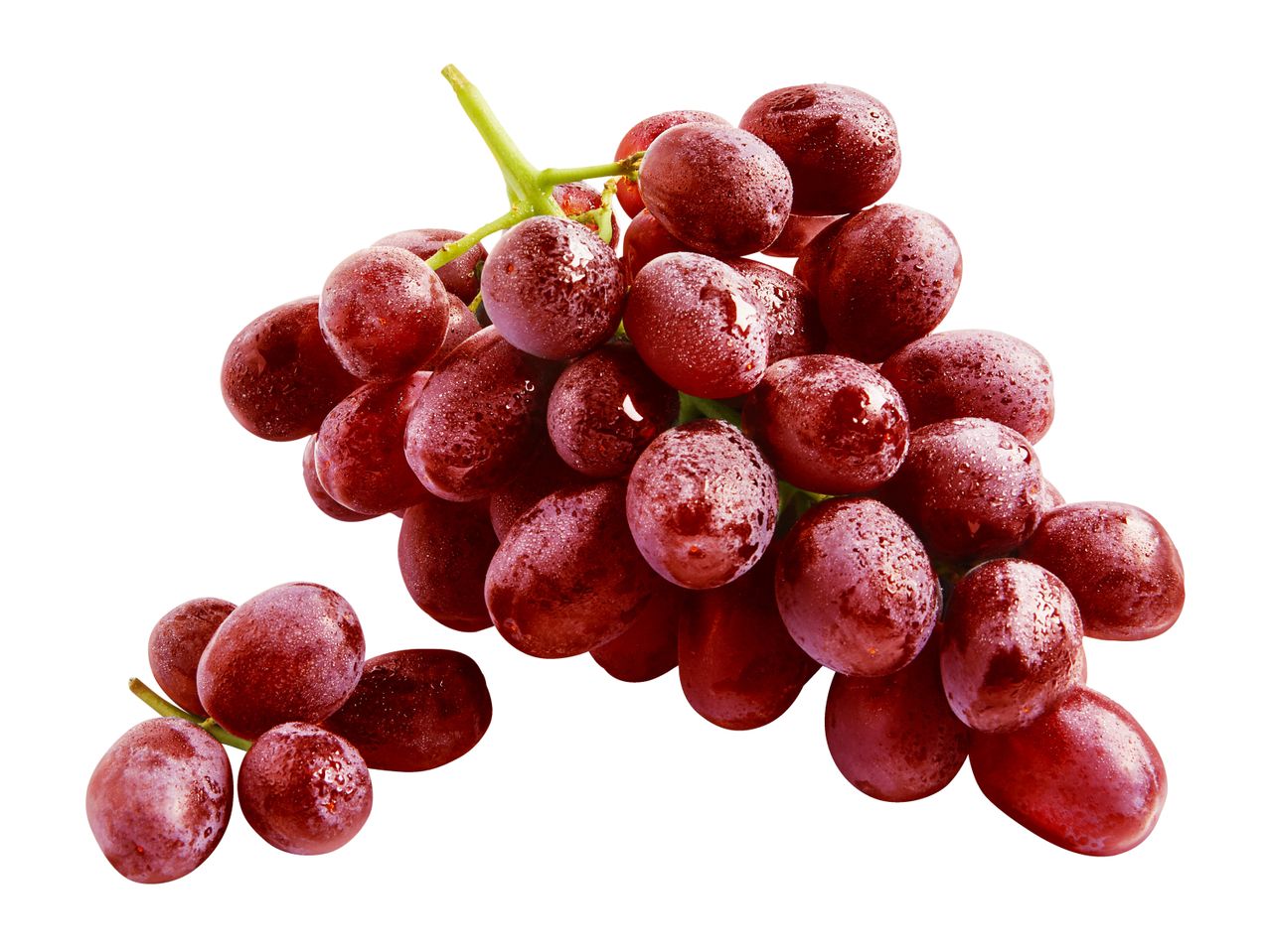 Fresh red grapes with water droplets on a white background.
