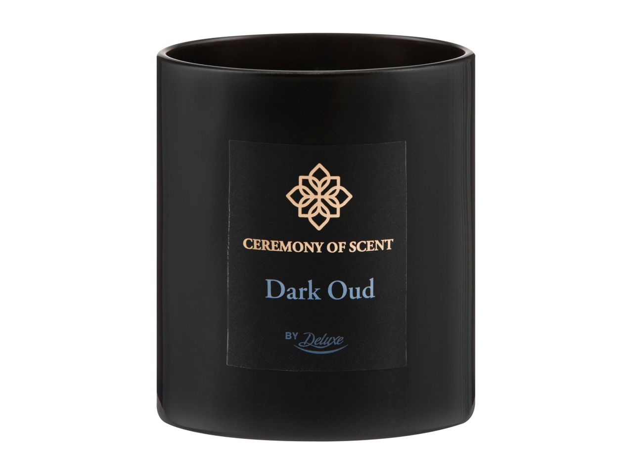 Black candle in a jar with a label reading 'CEREMONY OF SCENT Dark Oud BY Deluxe'