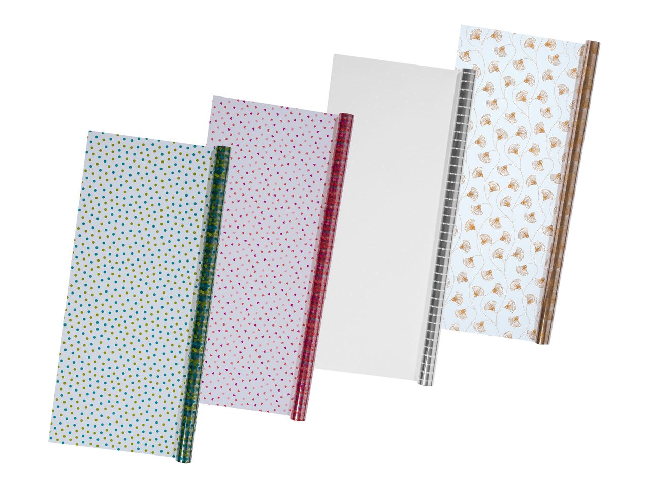 Vier Rollen Geschenkpapier mit verschiedenen Mustern: Punkte, Herzen, Sterne und Ginkgoblätter.