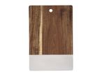 Wooden cutting board with a white bottom section and a hanging hole.