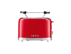 Red SILVERCREST® toaster with the year „1973” printed.