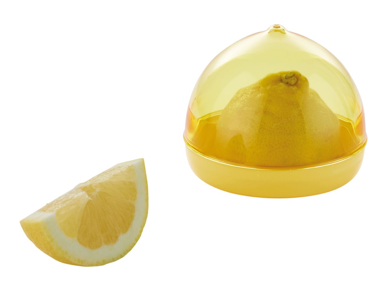 A yellow lemon squeezer and a lemon wedge.