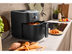 SILVERCREST® XL Air Fryer cooking sweet potato fries in a kitchen setting.