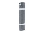 Rolled-up grey sleeping mat with a white valve and two white elastic bands