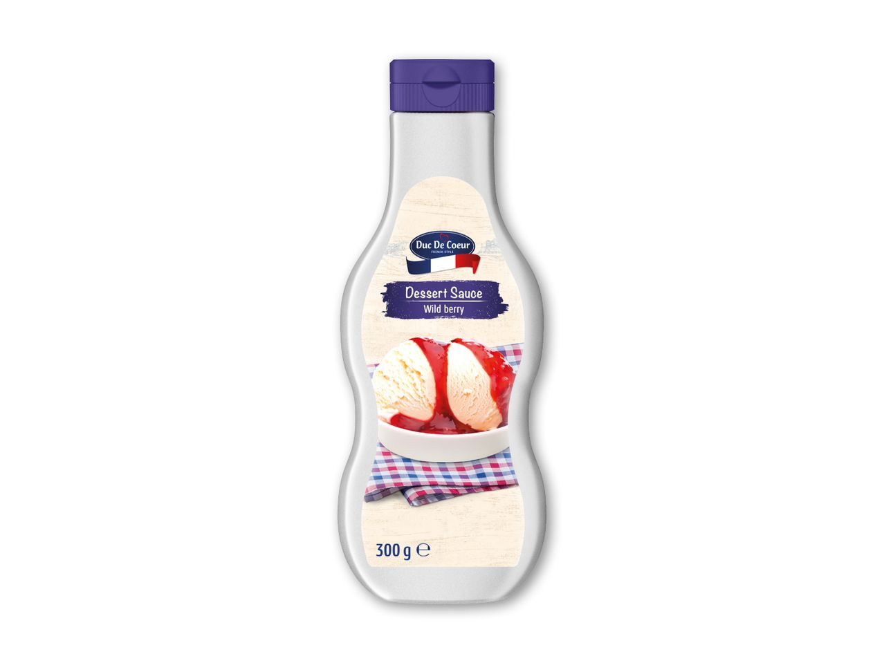 Dessertsauce med vilde bær i en flaske, der hældes over vaniljeis.