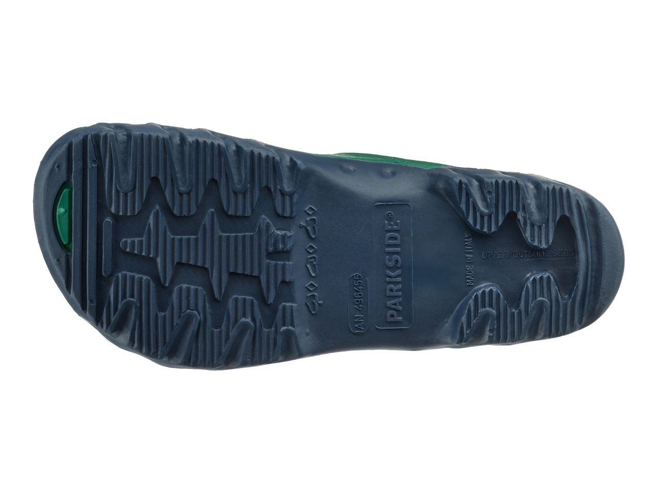 Bottom view of a dark blue shoe sole with a green insert and textured grip.