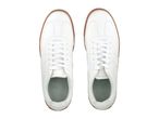 Pair of white sneakers with brown soles