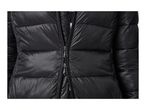 Close-up of a black puffer jacket with a partially unzipped front
