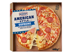 McEnnedy American Style Supreme Pizza with mozzarella, mushrooms, smoked salami, and ham.