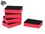 A stack of Dirt Devil scrubbing sponges, one separate sponge sits to the right.