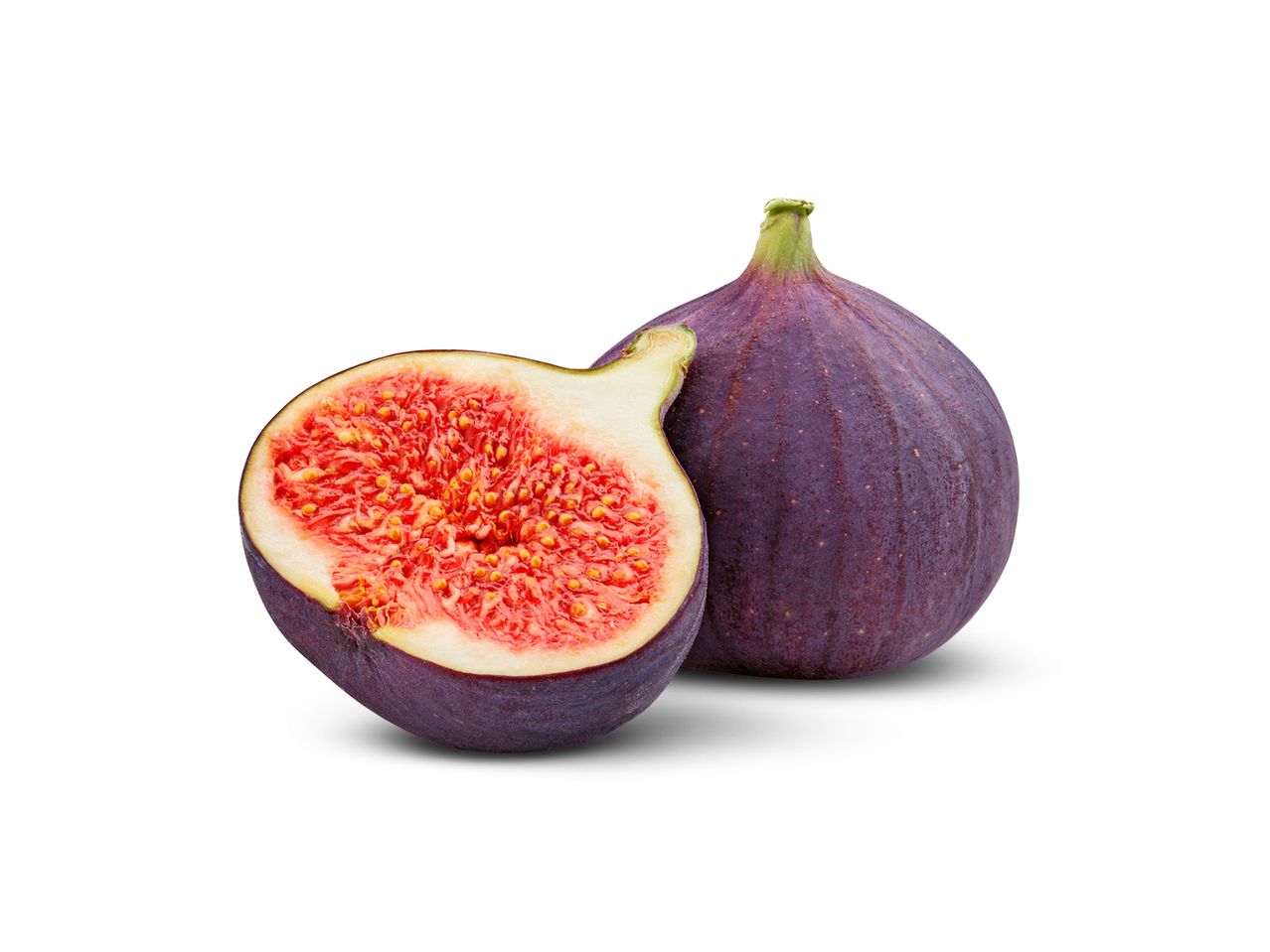 A whole fig and a half fig showing its red flesh and seeds on a white background.