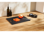 SILVERCREST® Chopping Board with chopped red pepper, knife, oil bottles, salt, and pepper.
