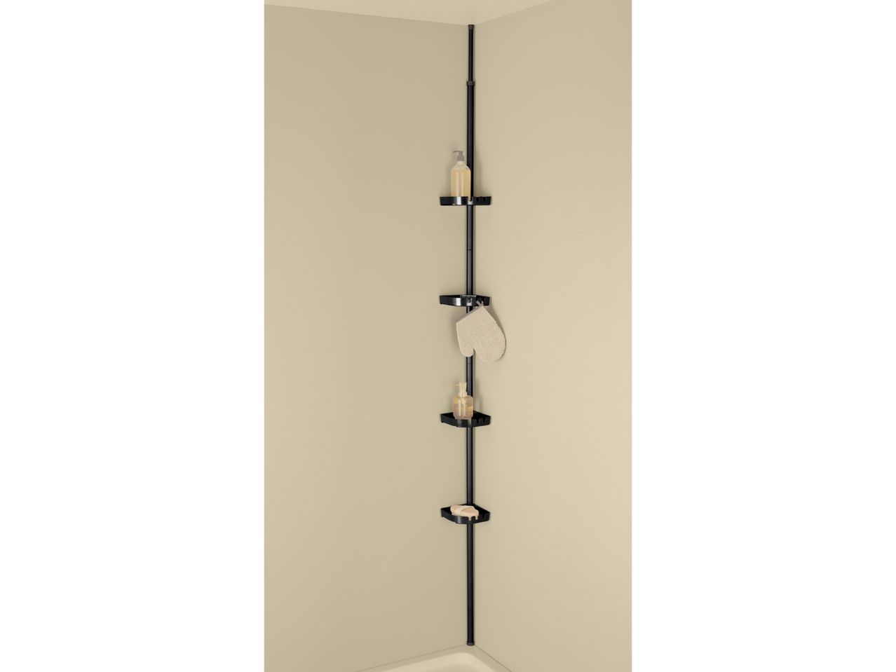 Black corner shower caddy with four shelves holding soap, lotion, and a loofah.