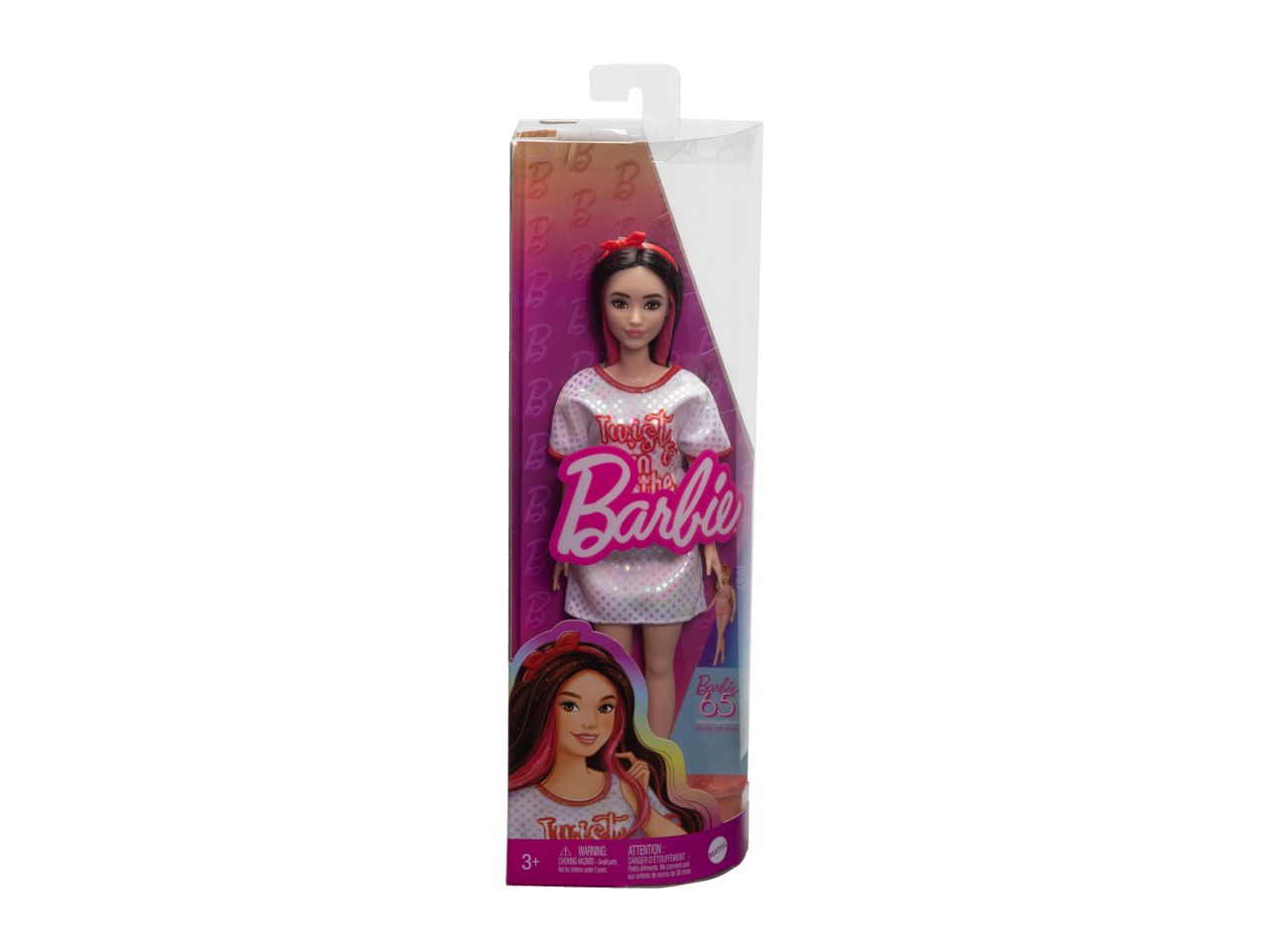 Barbie 65th Anniversary Twist doll in a sparkly dress, packaged in a clear plastic box with colorful graphics.