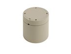 Beige cylindrical container with lid.