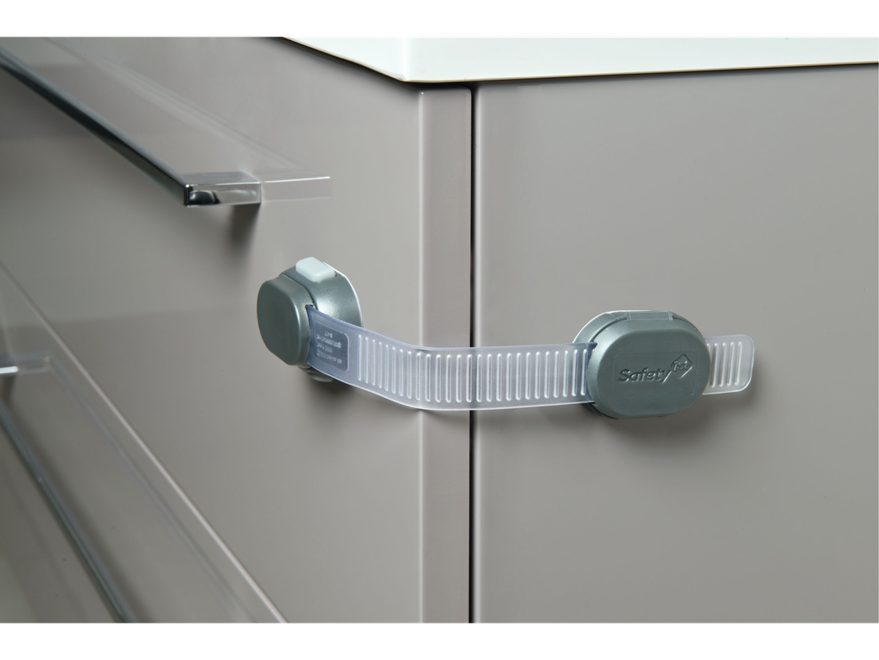 Safety 1st child safety lock on a cabinet