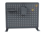 Dark grey pegboard with a shelf, a pen holder, and two brass hooks.