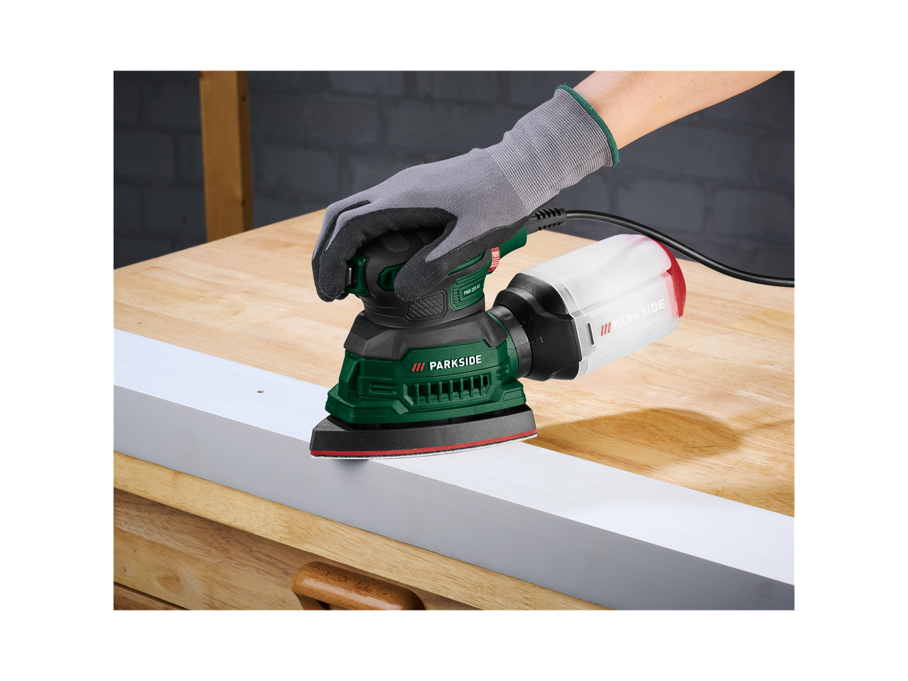 A Parkside sander is used to sand a wooden surface.