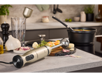 SILVERCREST® hand blender set with ingredients for soup on a kitchen counter.