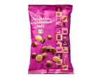 Zak chocolade kruidnotenmix met Fairtrade-logo en Sinterklaas-thema-illustraties.