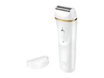 White electric shaver with gold trim and a clear protective cap