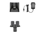 Charging station with power adapter and accessory holder for a handheld vacuum cleaner.