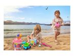 Two children playing with beach toys, including buckets, a truck, and a watering can.