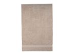 A beige bath towel with a subtle textured pattern and a decorative band at the bottom.