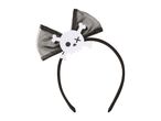 Black headband with a sheer bow and a white skull and crossbones decoration.