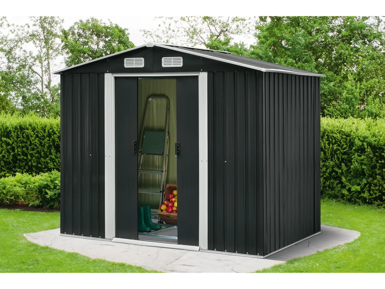 Dark grey garden shed with open sliding doors, a ladder and apples inside.