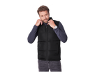 Homem com colete acolchoado preto Esmara MEN e jeans cinzentos.