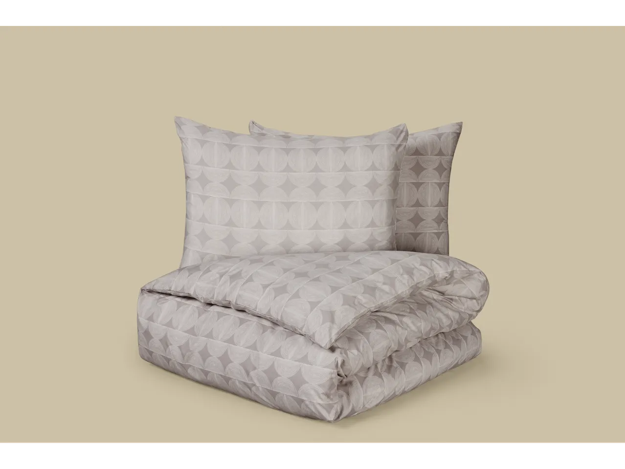 LIVARNO home microfibre sateen duvet cover set with two pillows and a folded duvet.