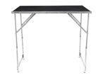 A black and silver foldable work table with adjustable legs on a white background.