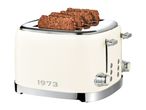 Cream-colored retro 4-slice toaster with bread slices, featuring '1973' lettering.