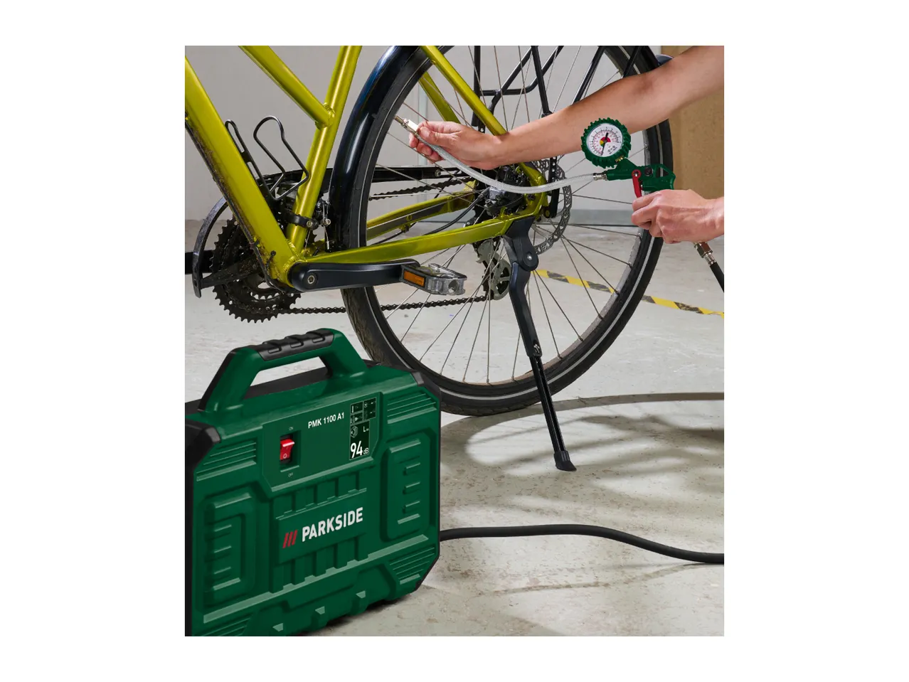 PARKSIDE air compressor PMK 1100 A1 inflating a bicycle tire.