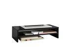 A black laptop stand with two shelves holds a laptop, books, and papers.